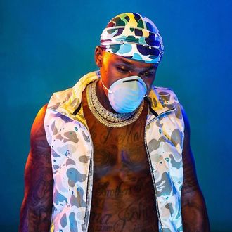 DaBaby Almost Cries After Louis Vuitton Sends Face Mask and Vest Customized  By @sheronbarber 