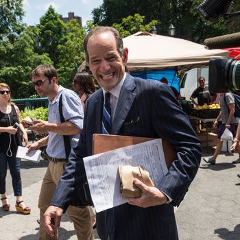 NEW YORK, NY - JULY 08: Former New York Gov. Eliot Spitzer collects signatures from citizens to run for comptroller of New York City on July 8, 2013 in New York City. Spitzer resigned as governor in 2008 after it was discovered that he was using a high end call girl service. (Photo by Andrew Burton/Getty Images)
