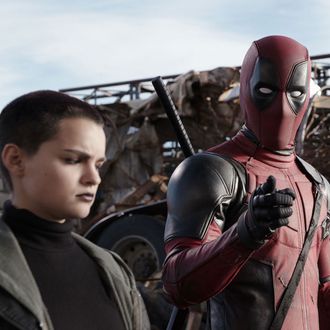 Deadpool (Ryan Reynolds) pauses from a life-and-death battle to break the fourth wall, much to the dismay of his comrades Negasonic Teenage Warhead (Brianna Hildebrand) and Colossus (voiced by Stefan Kapicic).