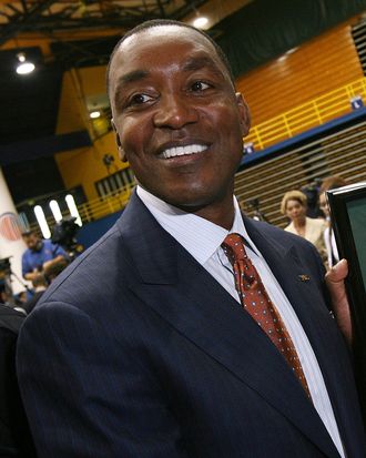 MIAMI - APRIL 15: Isiah Thomas is presented with artwork by Fernando Ottati after he was introduced as the new head coach for Florida International Univeristy men's basketball team at U.S.Century Bank Arena on April 15, 2009 in Miami, Florida. (Photo by Doug Benc/Getty Images)