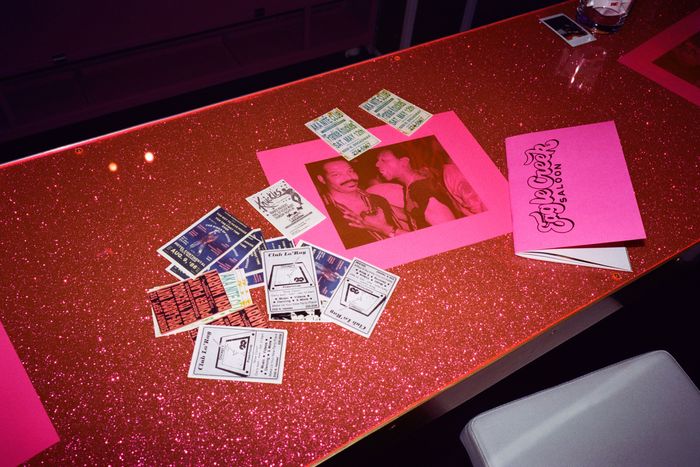 Archival fliers on the bar.