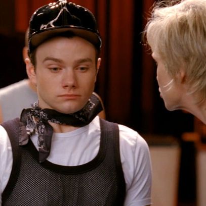 We have no idea what Sue is berating poor Kurt about, but maybe it’s because she’s bummed he didn’t have the stones to wear a mesh tank sans undershirt. That said, we're pretty relieved he resisted. The Village People don’t need more members right now.