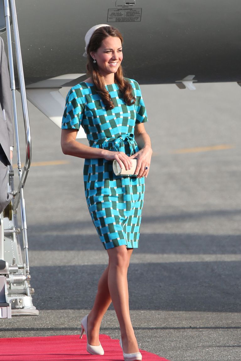 HONIARA, GUADALCANAL ISLAND, SOLOMON ISLANDS - SEPTEMBER 16:  Catherine, Duchess of Cambridge arrives at Honiara International Airport during their Diamond Jubilee tour of the Far East on September 16, 2012 in Honiara, Guadalcanal Island. Prince William, Duke of Cambridge and Catherine, Duchess of Cambridge are on a Diamond Jubilee tour representing the Queen taking in Singapore, Malaysia, the Solomon Islands and Tuvalu.  (Photo by Chris Jackson/Getty Images)