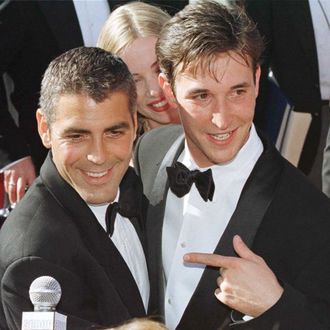 Actors Noah Wylie (R) and George Clooney (L), the