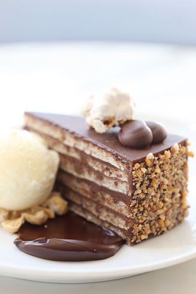 Torta di Nocciola – Hazelnut biscuit, Gianduja mousse, chocolate ganache, fiore di latte gelato