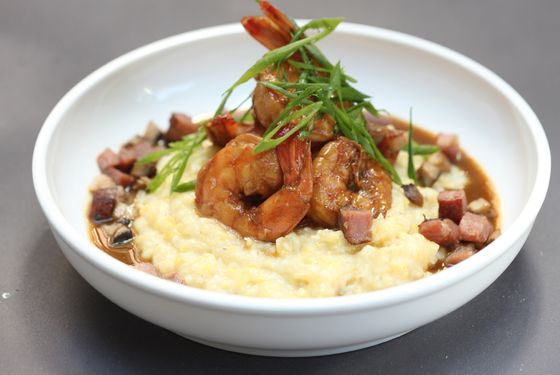 Shrimp and grits with mushrooms and Tasso ham.