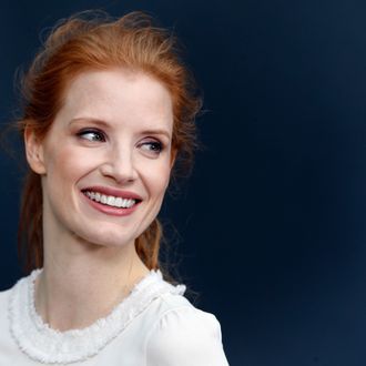 US actress Jessica Chastain poses on March 5, 2013 as she arrives to attend Chanel's Fall/Winter 2013-2014 ready-to-wear collection show at the Grand Palais in Paris.