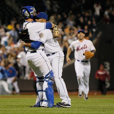 Johan Santana #57 of the New York Mets celebrates with Josh Thole #30 after pitching a no hitter against the St. Louis Cardinals at CitiField on June 1, 2012 in the Flushing neighborhood of the Queens borough of New York City. Johan Santana pitches the first no hitter in Mets history. The Mets won 8-0.