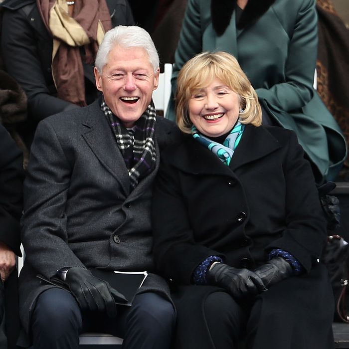Hillary and Bill Clinton (right) sit with New York Governor Andrew Cuomo and his girlfriend Sandra Lee (left) as they watch ceremonies for New York City's 109th Mayor Bill de Blasio on January 1, 2014 in New York City. Mayor de Blasio was sworn in using a Bible once owned by President Franklin Delano Roosevelt. Following the 12 years of the Michael Bloomberg administration, Mayor de Blasio won on a liberal platform that emphasized the growing gulf between the rich and poor in New York City.