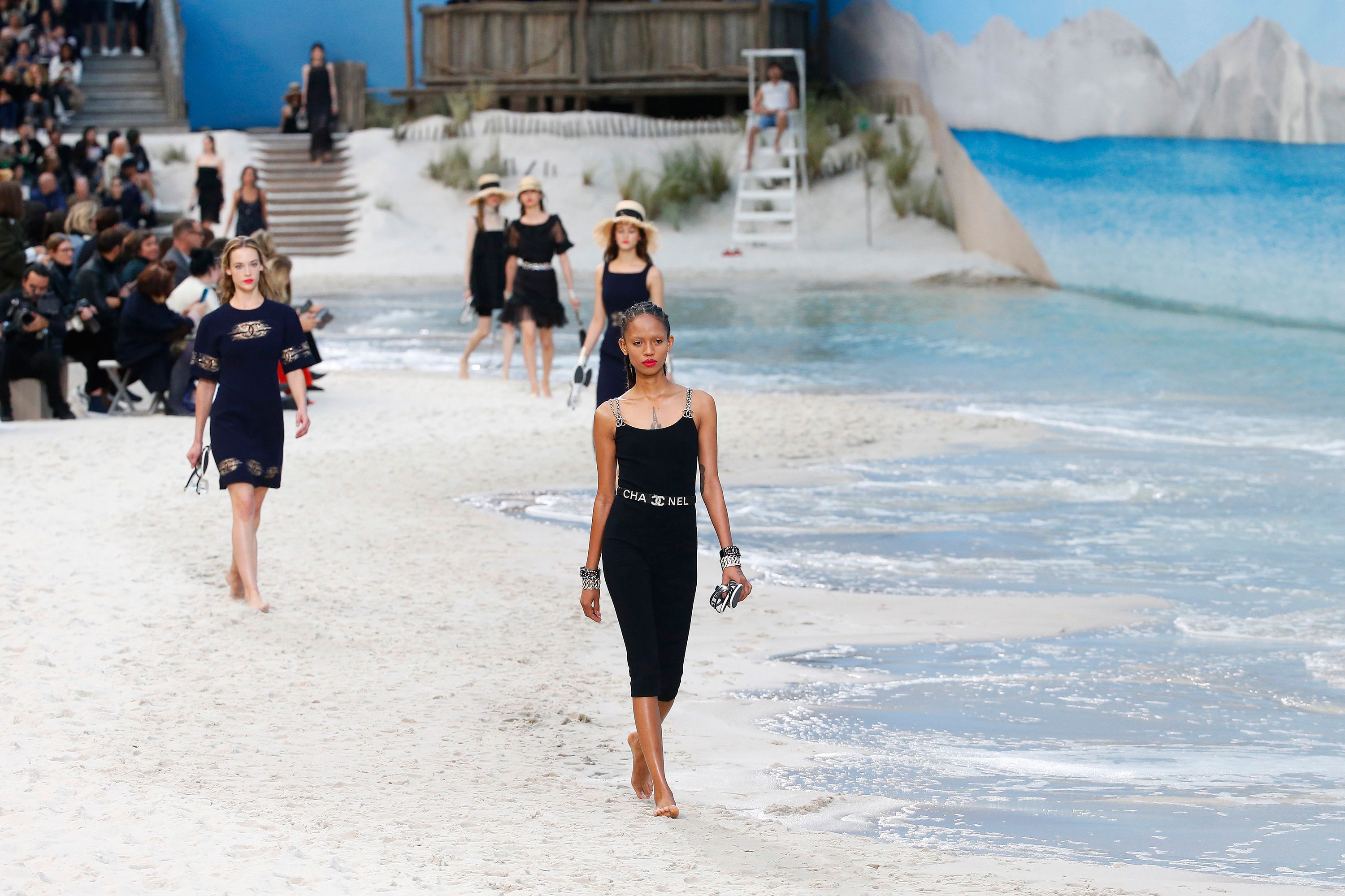 Chanel's Spring 2019 Runway Was a Beach With an Ocean and Lifeguard On Duty