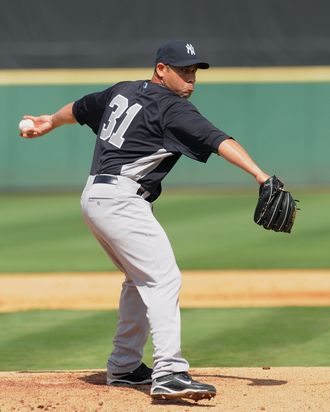 LAKELAND, FL - FEBRUARY 28: Pedro Feliciano #31 of the New York Yankees pitches against the Detroit Tigers during the spring training game at Joker Marchant Stadium on February 28, 2011 in Lakeland, Florida. The Tigers defeated the Yankees 6-2. (Photo by Mark Cunningham/MLB Photos via Getty Images) *** Local Caption *** Pedro Feliciano