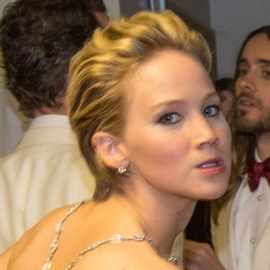 The "Dog With an Underbite Growling at a Dog With a Standard Bite Who Has Her Bone."