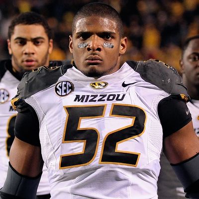  Michael Sam #52 of the Missouri Tigers participates in pregame activities prior to a game against the Ole Miss Rebels at Vaught-Hemingway Stadium on November 23, 2013 in Oxford, Mississippi. 