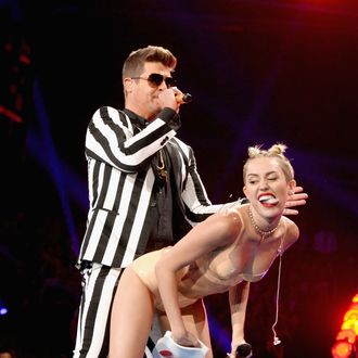 NEW YORK, NY - AUGUST 25: Robin Thicke and Miley Cyrus perform during the 2013 MTV Video Music Awards at the Barclays Center on August 25, 2013 in the Brooklyn borough of New York City. (Photo by Jeff Kravitz/FilmMagic for MTV)