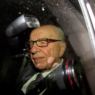 Rupert Murdoch, chief executive officer of News Corp., is driven from his apartment in London, U.K., on Monday, July 18, 2011. News Corp.'s Murdoch is struggling to control the destiny of the company he began building six decades ago after a trusted deputy was arrested and Scotland Yard's top official quit over ties to a suspect in the phone-hacking probe. Photographer: Simon Dawson/Bloomberg via Getty Images