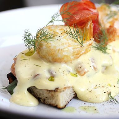 House-cured salmon, tomato Hollandaise, poached eggs, chard