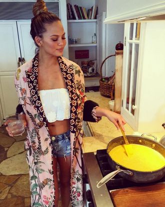 Chrissy Teigen's crazy cheese wheel Christmas present, explained