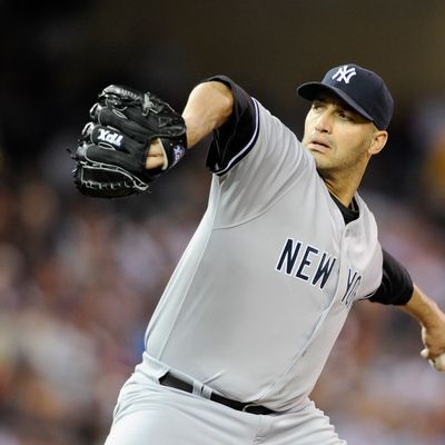 Andy Pettitte #46 of the New York Yankees delivers a pitch against the Minnesota Twins during the first inning on September 24, 2012 at Target Field in Minneapolis, Minnesota. 