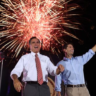 FISHERSVILLE, VA - OCTOBER 04: Republican presidential candidate, former Massachusetts Gov. Mitt Romney (L) and his running mate Rep Paul Ryan (R-WI) wave to supporters during a campaign rally at the Augusta Expoland on October 4, 2012 in Fishersville, Virginia. One day after the first Presidential debate, Mitt Romney spoke to the CPAC before heading to Virginia to campaign with his running mate Rep Paul Ryan (R-WI). (Photo by Justin Sullivan/Getty Images)