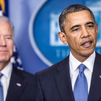 U.S. President Barack Obama makes a statement alongside U.S. Vice President Joseph R. Biden (L) in the White House Briefing Room following passage by the House of tax legislation on January 1, 2013 in Washington, DC. The House and Senate have now both passed the legislation, averting the so-called fiscal cliff.