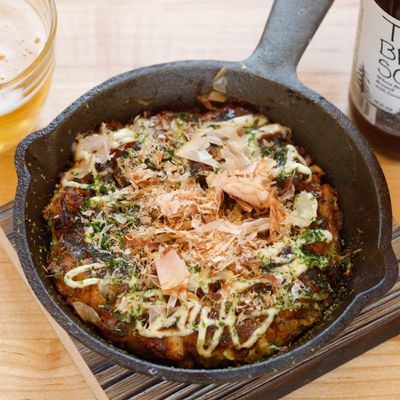 Okonomiyaki: classic Osaka-style cabbage-and-pork-belly savory pancake.