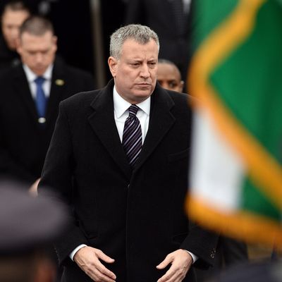 New York City Mayor Bill de Blasio attends the funeral of New York Police Department (NYPD) officer Wenjian Liu in New York's borough of Brooklyn on January 4, 2015.