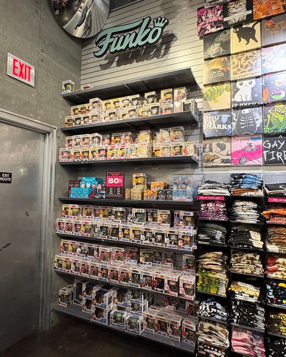 A floor-to-ceiling display of Funko Pops. 