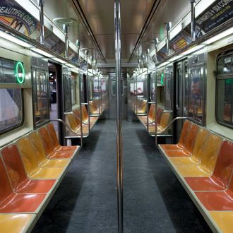 A Number 7 subway train waits for passengers at the Times Square, 42nd Street station, Manhattan, New York City, USA