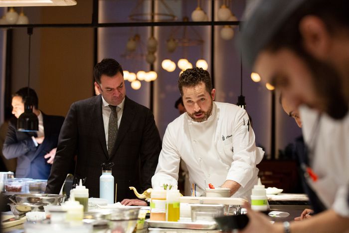 The chef James Kent, right, with his business partner Jeff Katz, left, in the kitchen of Crown Shy in New York, March 14, 2019. (Caitlin Ochs/The New York Times)