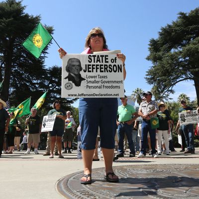 Laura Reeg, of Yuba City, joined dozens of others from several rural counties in support of creating the the state of Jefferson, at a Capitol the in Sacramento, Calif., Thursday, Aug. 28, 2014. 