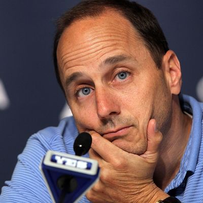 NEW YORK, NY - JULY 08: General manager Brian Cashman of the New York Yankees speaks to the media after the game against the Tampa Bay Rays was postponed due to rain on July 8, 2011 at Yankee Stadium in the Bronx borough of New York City. (Photo by Jim McIsaac/Getty Images)