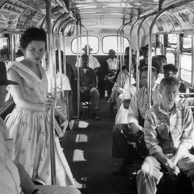 African American citizens sitting in the rear of the bus in compliance with South Carolina segregation law.