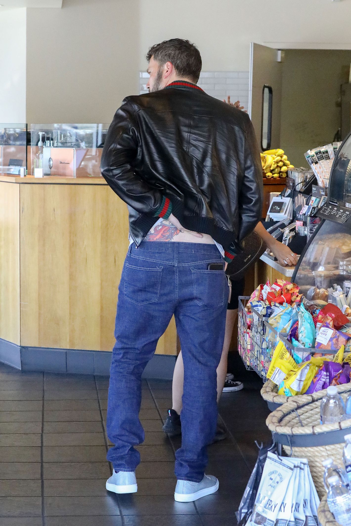 Ben Affleck Knows You Mocked His Giant Back Tattoo But Hes Doing Just  Fine