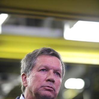 TOLEDO, OH - NOVEMBER 16: Ohio Gov. John Kasich listens to a speaker at the Toledo Assembly Complex on November 16, 2011 in Toledo, Ohio. Chrysler Group LLC says it will add 1,100 jobs at the Toledo, Ohio assembly complex along with a new body shop and quality center as part of an overall $1.7 billion investment to build a new generation of Jeep sport utility vehicles. (Photo by J.D. Pooley/Getty Images)