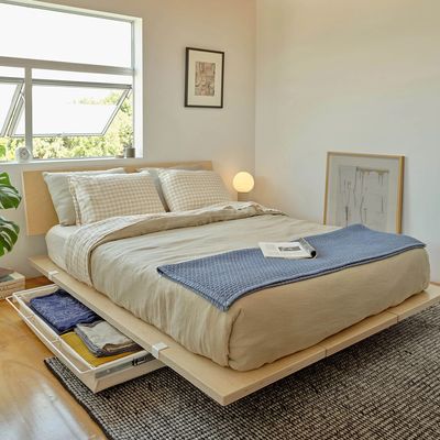 Stand for store bed frame