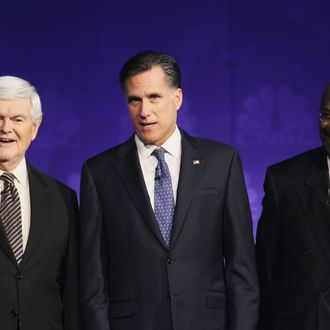 Former speaker of the house Newt Gingrich, former massachusetts Gov. Mitt Romney prior to a debate hosted by CNBC and the Michigan Republican Party at Oakland University on November 9, 2011.