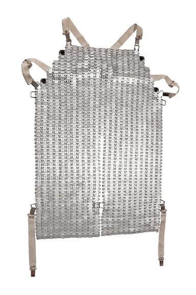 设计图标买了这美丽的——我们rn by a prosciutto slicer and made from more than a thousand aluminum links — from the Milanese curiosity shop G. Lorenzi.