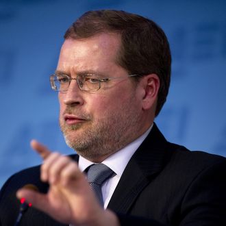 Founder of Americans for Tax Reform Grover Norquist participates in a debate at American Enterprise Institute in Washington, DC, November 29, 2011. AFP PHOTO/Jim WATSON (Photo credit should read JIM WATSON/AFP/Getty Images)