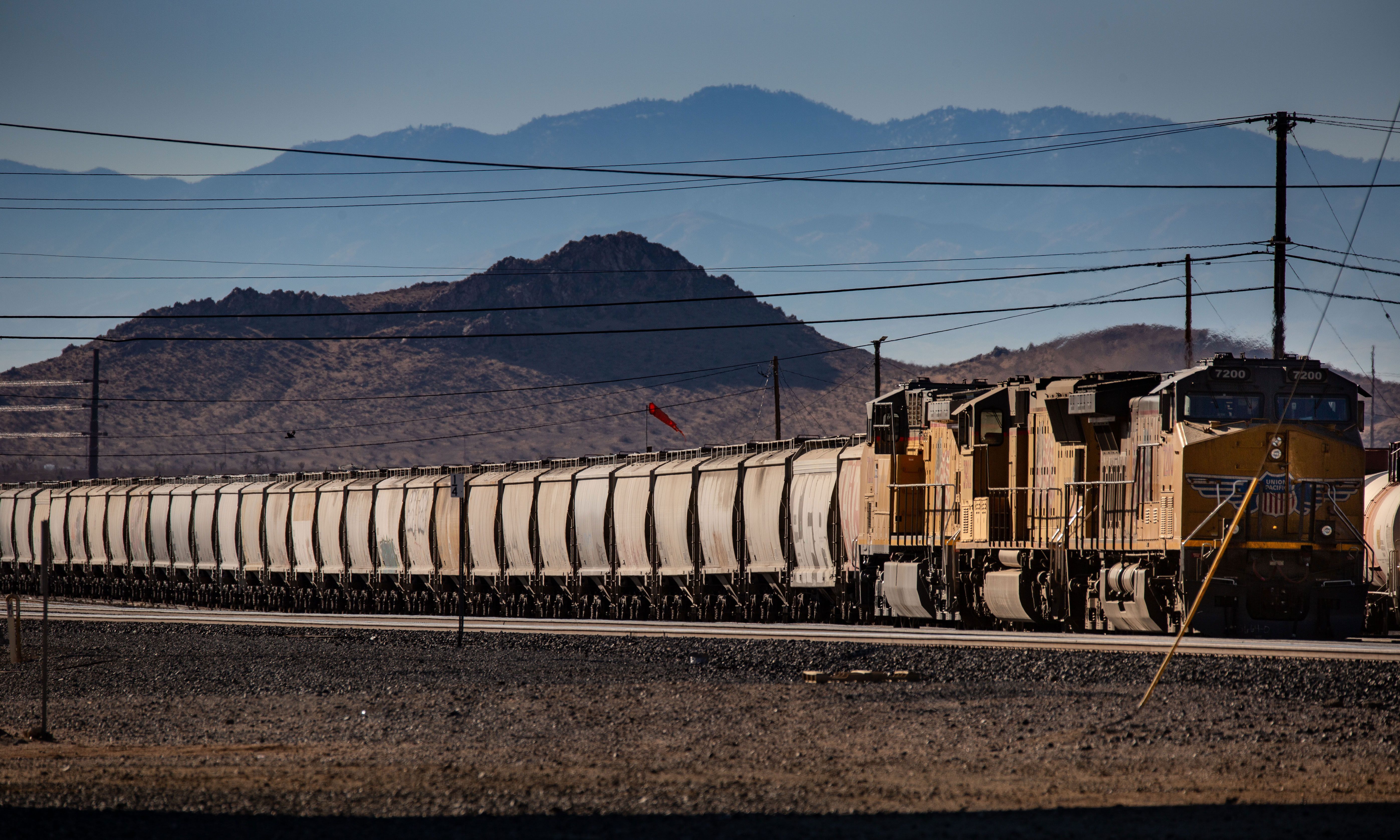 Rail workers win key concessions in deal to prevent strike