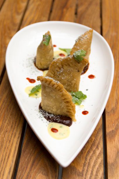 B.E.C Quesadillas, smoked pork belly, blue cheese, bearnaise, pasilla-prune-pulque.