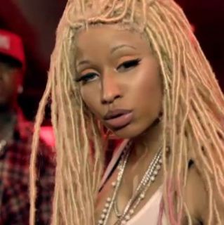 Watch Nicki Minaj Channel Lil Wayne In Birdman S Video