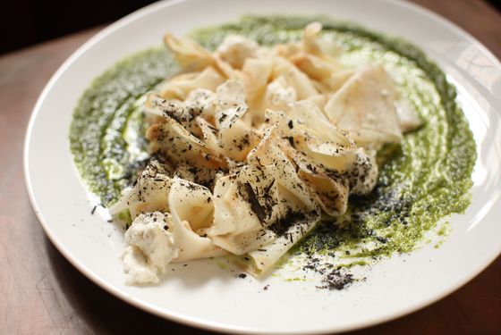 Celeriac with stracciatella and charred scallion.