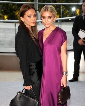 Mary-Kate Olsen and Ashley Olsen attend 2012 CFDA Fashion Awards at Alice Tully Hall on June 4, 2012 in New York City.