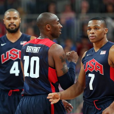 Russell Westbrook #7 of United States talks with Kobe Bryant #10 during the Men's Basketball Preliminary Round match on Day 8 of the London 2012 Olympic Games at the Basketball Arena on August 4, 2012 in London, England. 
