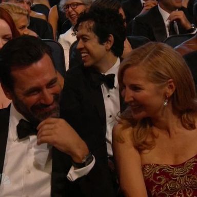 Jon Hamm is a hunk in many ways, but he sure laughs like a baby watching a kitty play with a little ball.