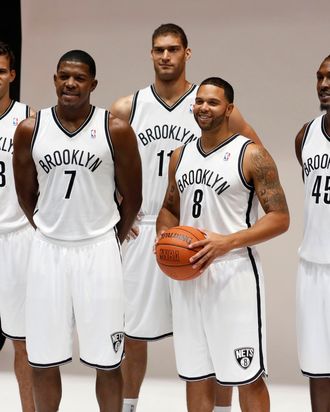 Brooklyn Nets Kris Humphries, Joe Johnson, Brook Lopez, Deron Williams, and Gerald Wallace, left to right, pose for photos during Brooklyn Nets basketball media day, in the Brooklyn borough of New York, Monday, Oct. 1, 2012.