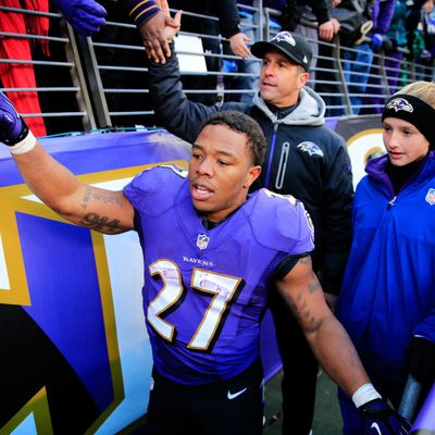 BALTIMORE, MD - NOVEMBER 24: Ray Rice #27 and head coach John Harbaugh of the Baltimore Ravens walk off the field with his daughter Alison following the Ravens 19-3 win over the New York Jets at M&T Bank Stadium on November 24, 2013 in Baltimore, Maryland. (Photo by Rob Carr/Getty Images)