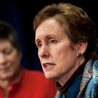 Secretary of Homeland Security Janet A. Napolitano (L) listens as General Services Administration Administrator Martha N. Johnson speaks during a news conference to discuss the 