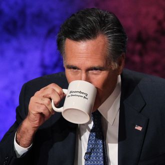 HANOVER, NH - OCTOBER 11: Former Massachusetts Gov. Mitt Romney takes a drink during a break in the Republican Presidential debate hosted by Bloomberg and the Washington Post on October 11, 2011 at Dartmouth College in Hanover, New Hampshire. Eight GOP candidates met for the first debate of the 2012 campaign focusing solely on the economy. (Photo by Justin Sullivan/Getty Images)