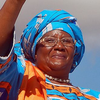 President Bingu wa Mutharika's runningmate Joyce Banda raises her index finger as symbol of the Democratic Progressive Party on May 14, 2009 in Lilongwe, during a campaign, for the upcoming elections. Malawi's constitutional court will, on May 15, rule on the eligibility of ex-president Bakili Muluzi to run for president for a third time in next week's elections. AFP PHOTO/ AMOS GUMULIRA (Photo credit should read AMOS GUMULIRA/AFP/Getty Images)
